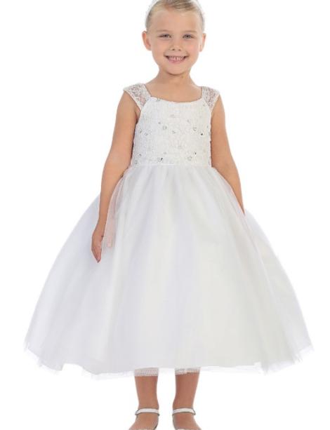 Reall cute little girl modeling a white flower girl dress