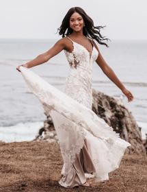 Model wearing wedding dress by the beach style 69283